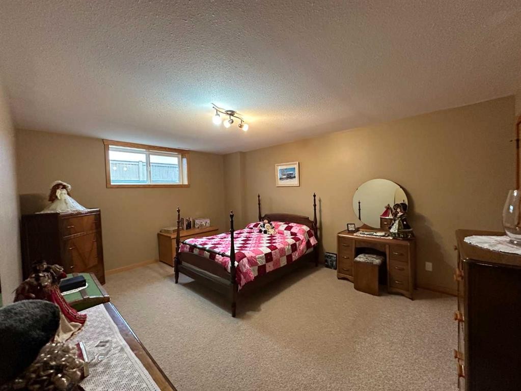 21 Ironstone Drive, Coleman, AB - Indoor Photo Showing Bedroom