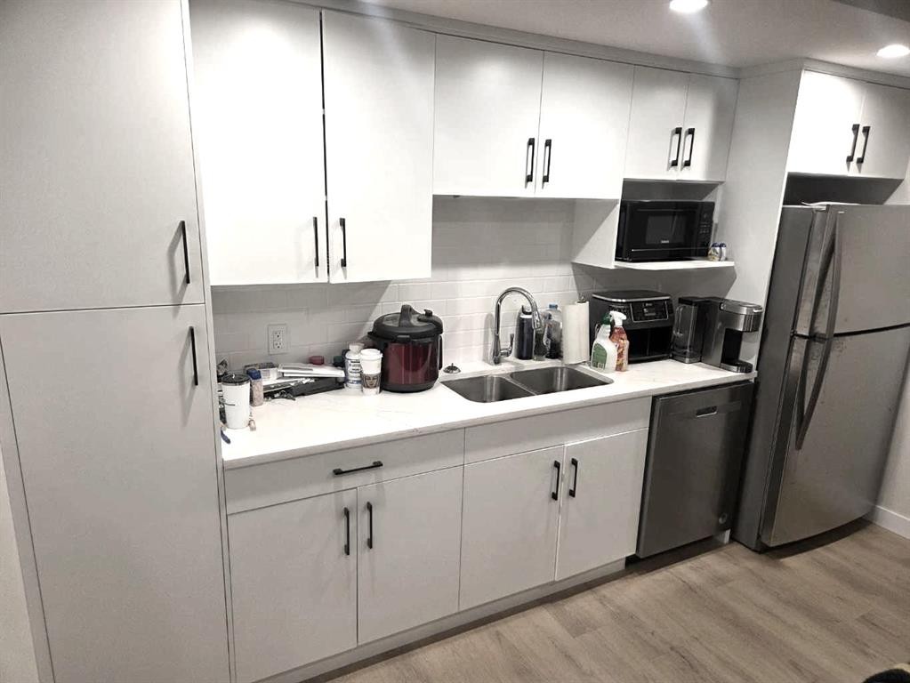 A & B-50 Sage Brush Avenue, Taber, AB - Indoor Photo Showing Kitchen With Double Sink
