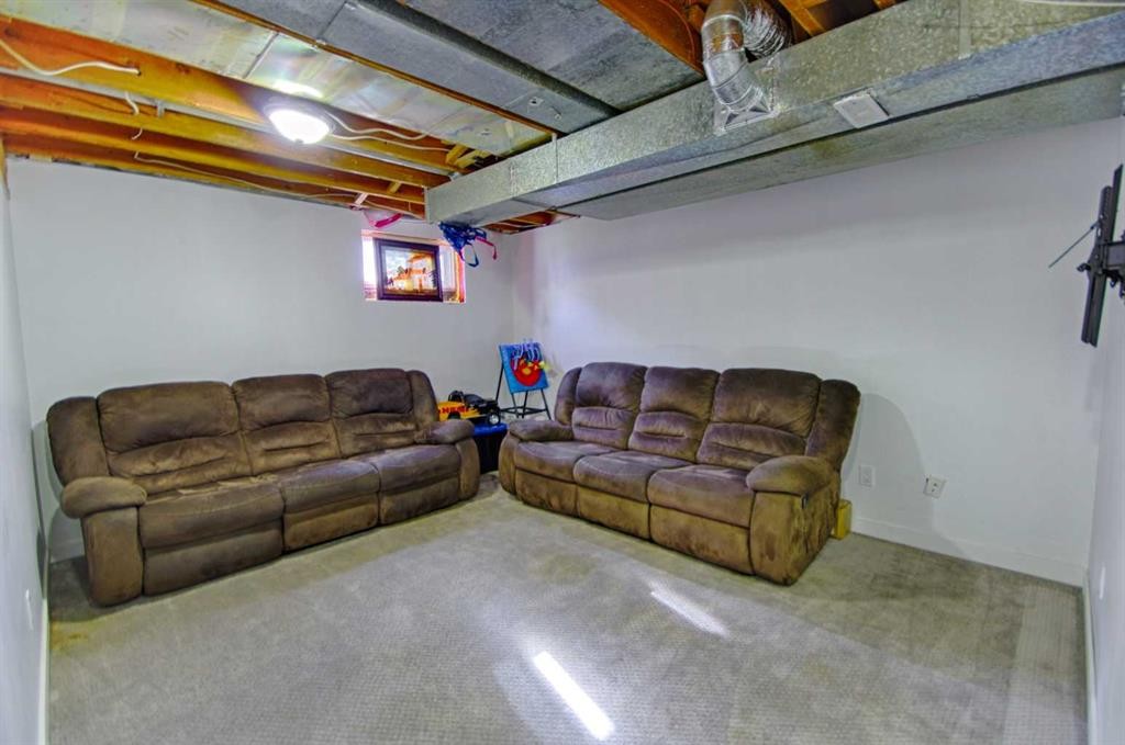 4925 53 Avenue, Taber, AB - Indoor Photo Showing Basement