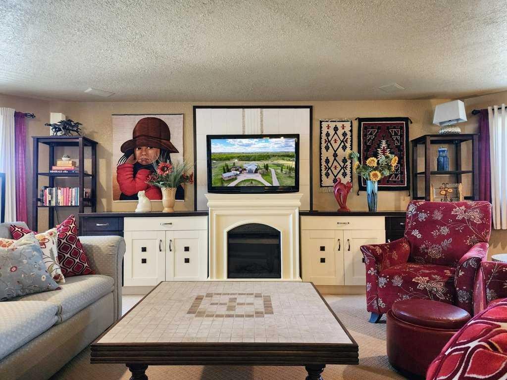 20 Deer Path Meadow, Fort Macleod, AB - Indoor Photo Showing Living Room With Fireplace