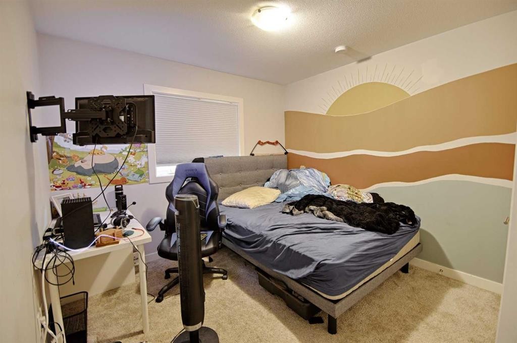 807 Sunset Place, Picture Butte, AB - Indoor Photo Showing Bedroom