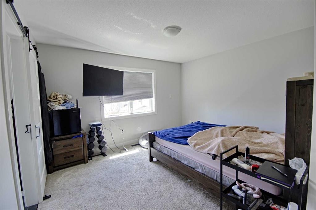 807 Sunset Place, Picture Butte, AB - Indoor Photo Showing Bedroom