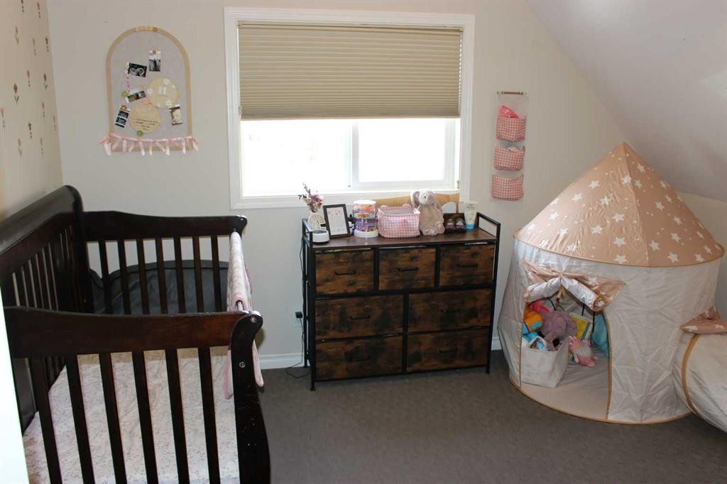 1607 23 Avenue, Coaldale, AB - Indoor Photo Showing Bedroom