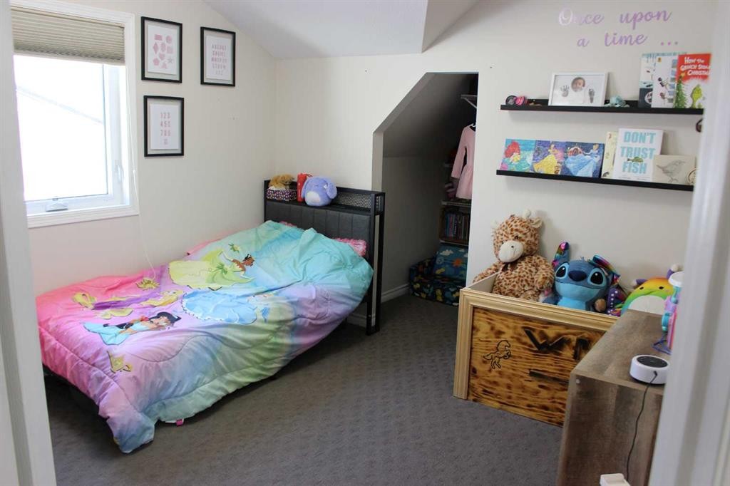1607 23 Avenue, Coaldale, AB - Indoor Photo Showing Bedroom