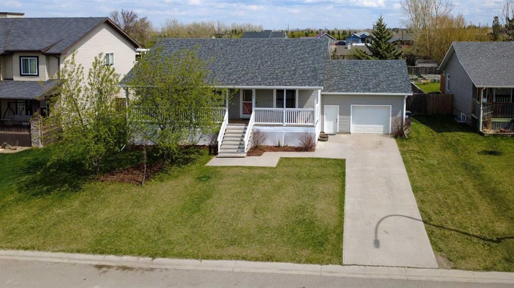 241 N 250 E, Raymond, AB - Outdoor With Deck Patio Veranda With Facade