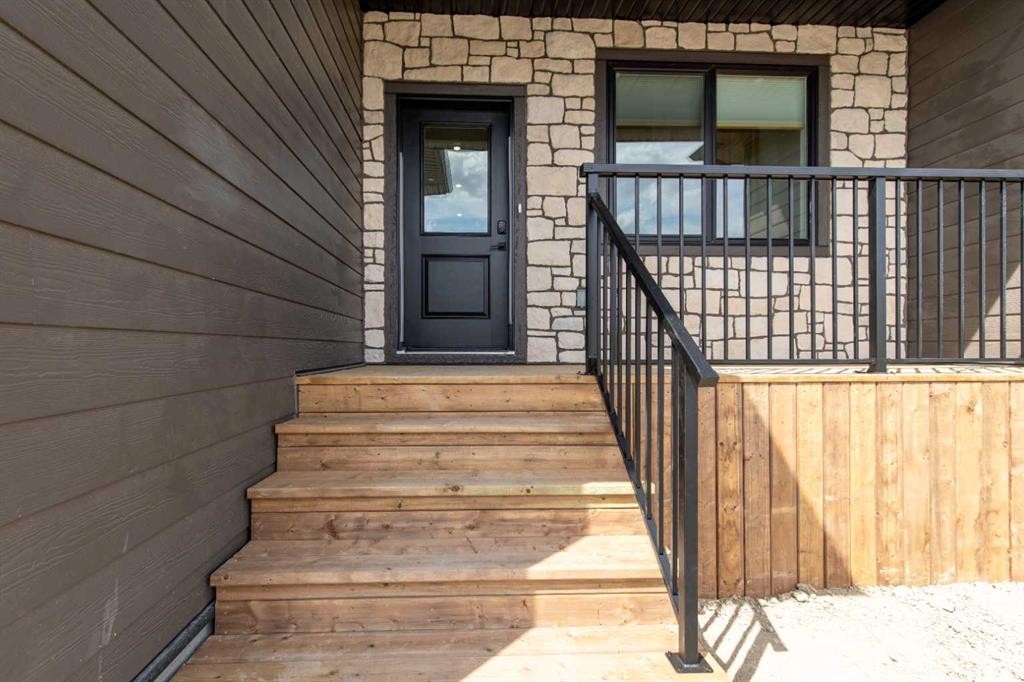 306 Bridge Crossing Close, Raymond, AB - Outdoor With Exterior