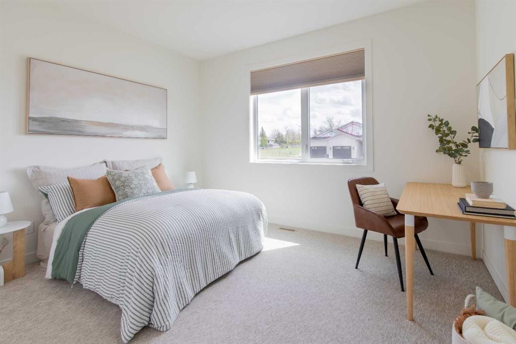 306 Bridge Crossing Close, Raymond, AB - Indoor Photo Showing Bedroom