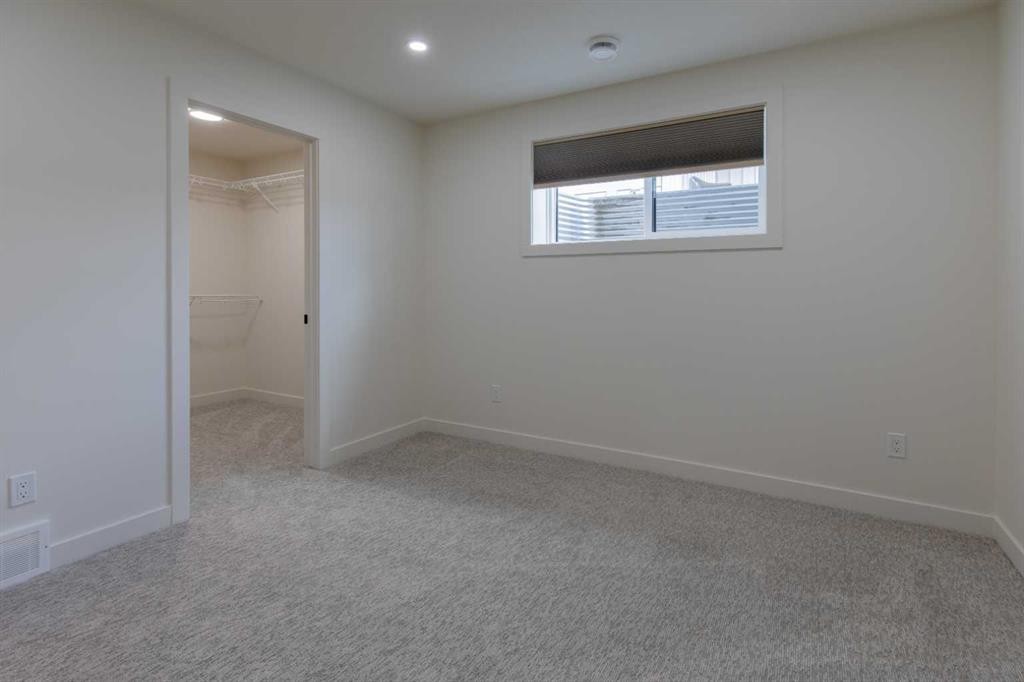 306 Bridge Crossing Close, Raymond, AB - Indoor Photo Showing Other Room