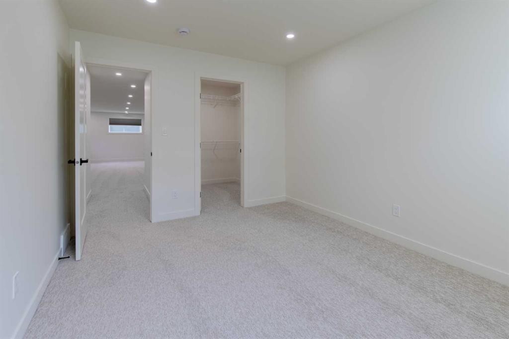 306 Bridge Crossing Close, Raymond, AB - Indoor Photo Showing Other Room
