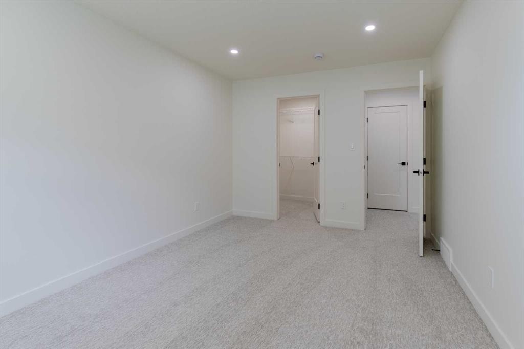306 Bridge Crossing Close, Raymond, AB - Indoor Photo Showing Other Room