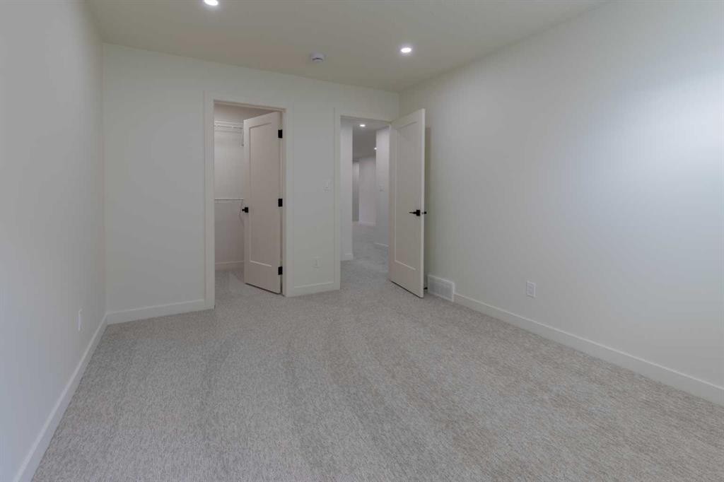 306 Bridge Crossing Close, Raymond, AB - Indoor Photo Showing Other Room
