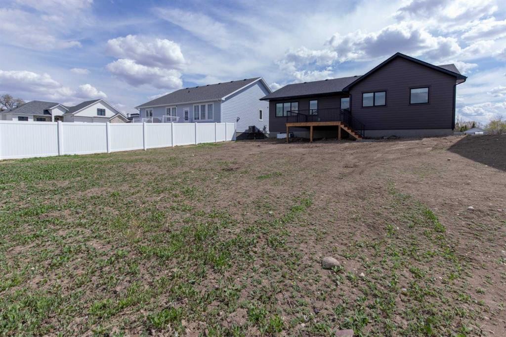 306 Bridge Crossing Close, Raymond, AB - Outdoor