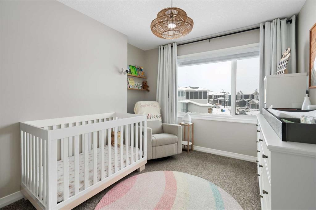 700 Seton Circle Se, Calgary, AB - Indoor Photo Showing Bedroom