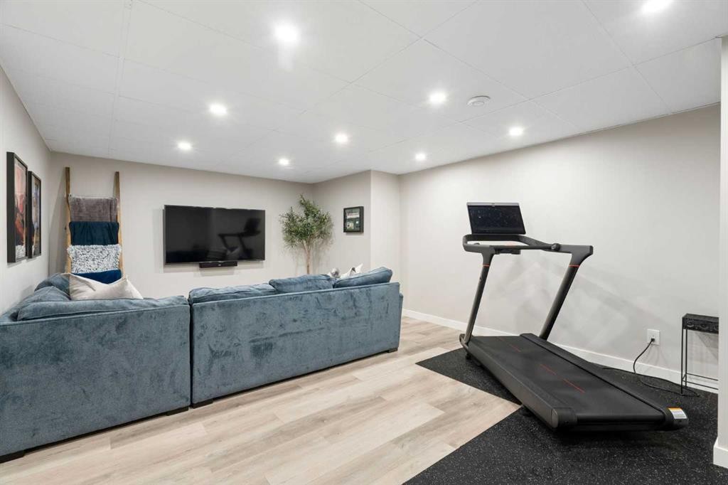 700 Seton Circle Se, Calgary, AB - Indoor Photo Showing Gym Room