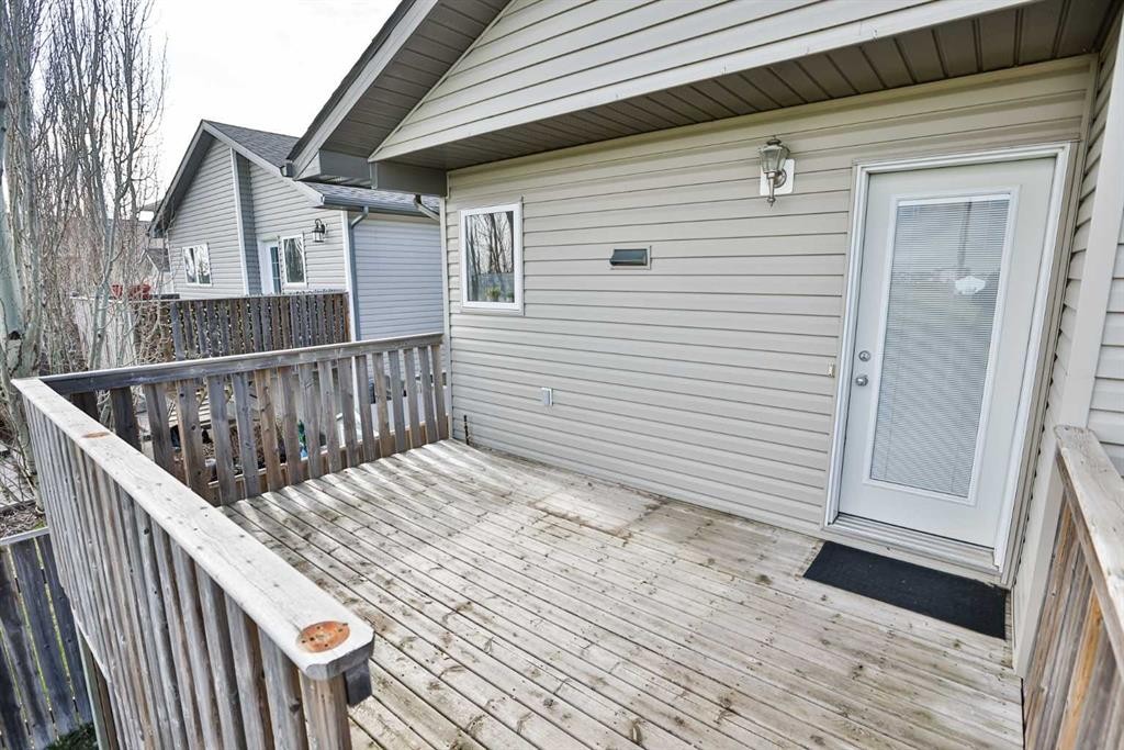 404 Lynx Crescent North, Lethbridge, AB - Outdoor With Deck Patio Veranda With Exterior