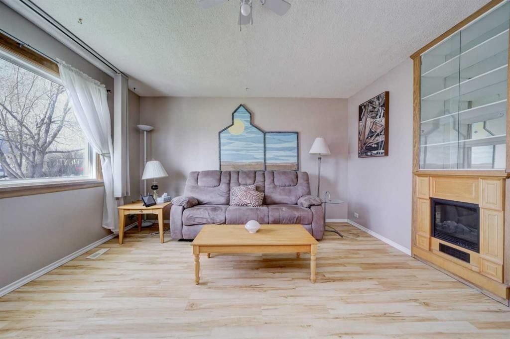 307 Grey Street, Granum, AB - Indoor Photo Showing Living Room With Fireplace