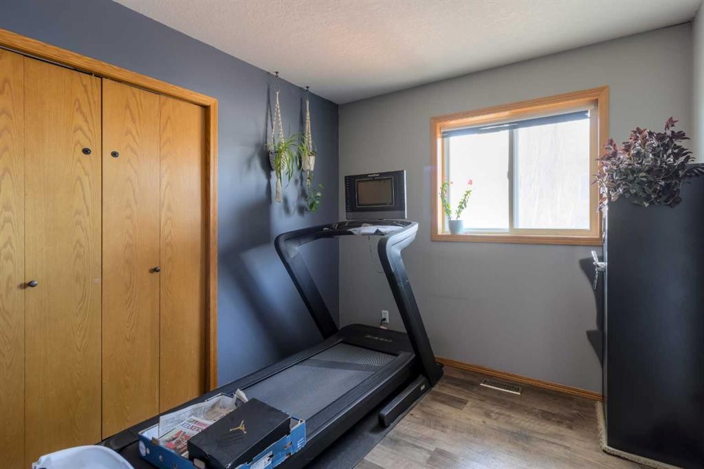 2404 9 Street, Coaldale, AB - Indoor Photo Showing Gym Room