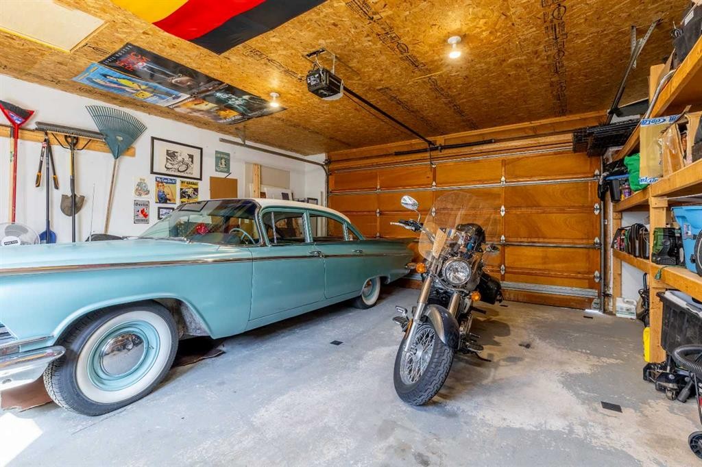 57 Honeysuckle Road North, Lethbridge, AB - Indoor Photo Showing Garage