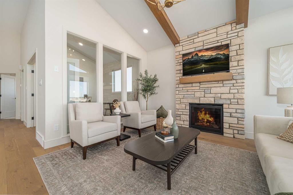 343 Blackwolf Boulevard North, Lethbridge, AB - Indoor Photo Showing Living Room With Fireplace