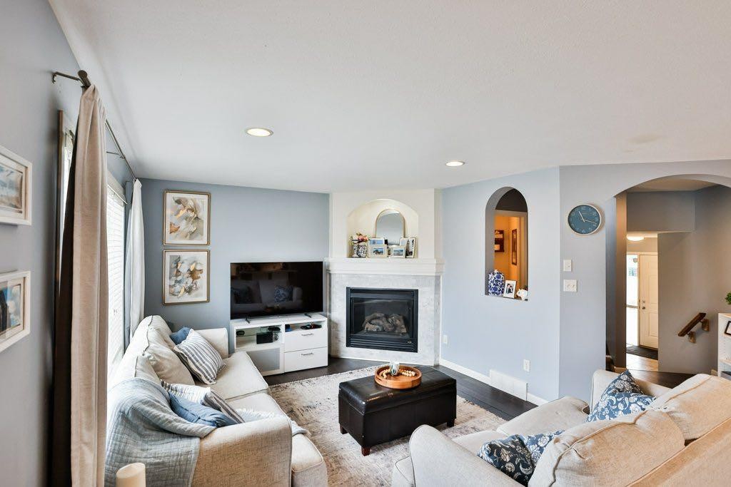 573 Squamish Lane West, Lethbridge, AB - Indoor Photo Showing Living Room With Fireplace