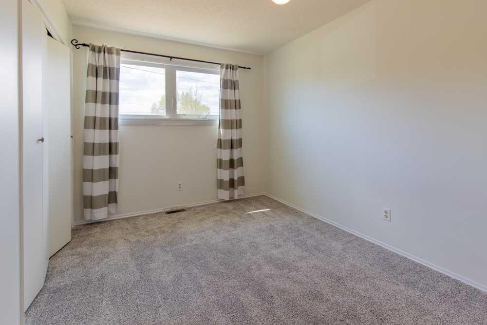 67 E 200 S, Raymond, AB - Indoor Photo Showing Other Room