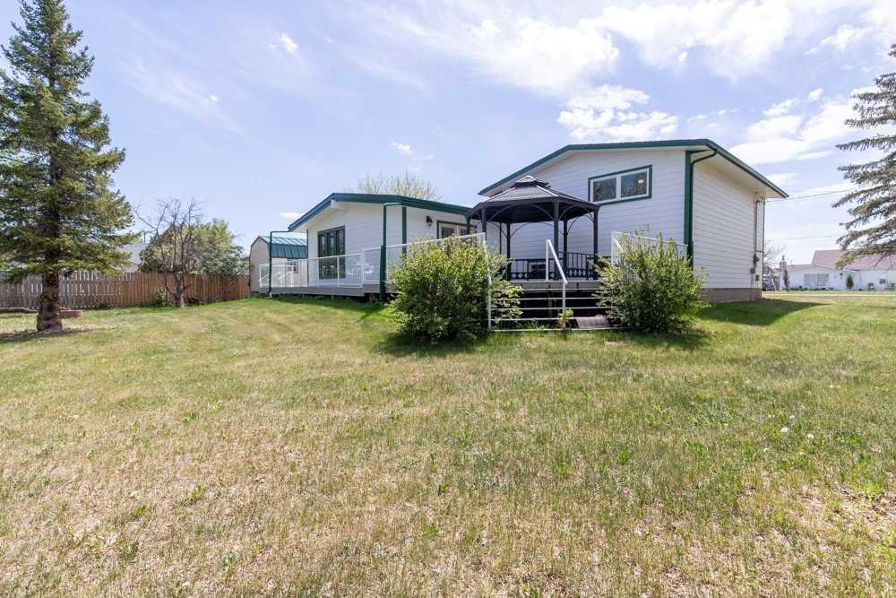 67 E 200 S, Raymond, AB - Outdoor With Deck Patio Veranda