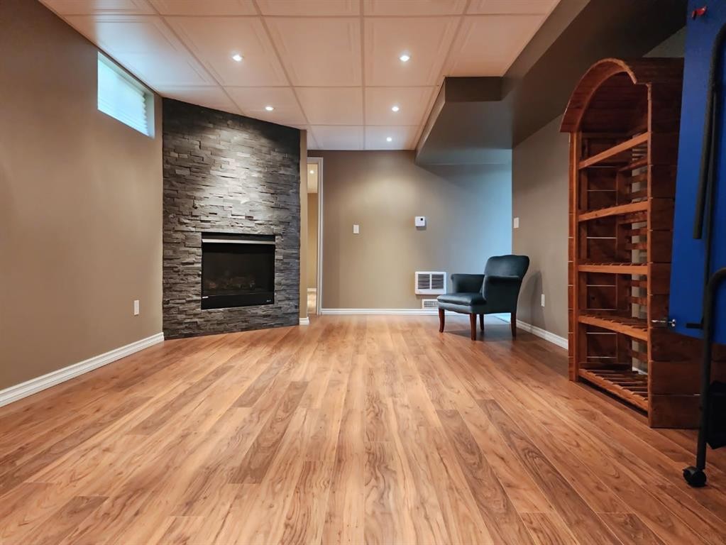 18 Willow Road, Claresholm, AB - Indoor With Fireplace