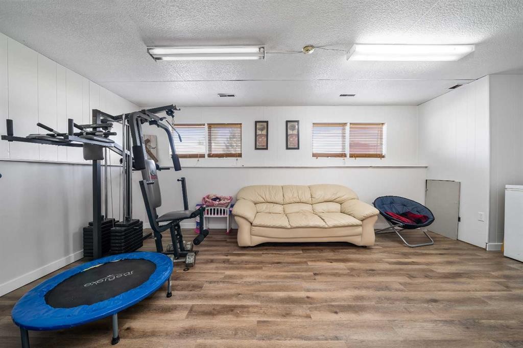 4734 60 Avenue, Taber, AB - Indoor Photo Showing Gym Room