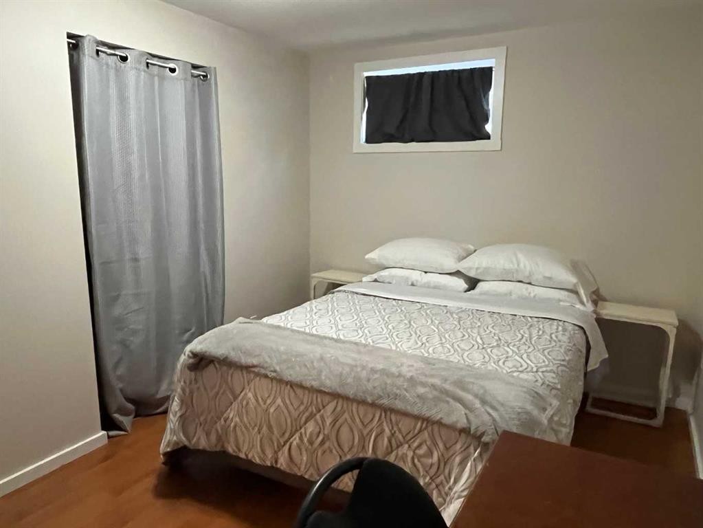 235S 50 West, Raymond, AB - Indoor Photo Showing Bedroom