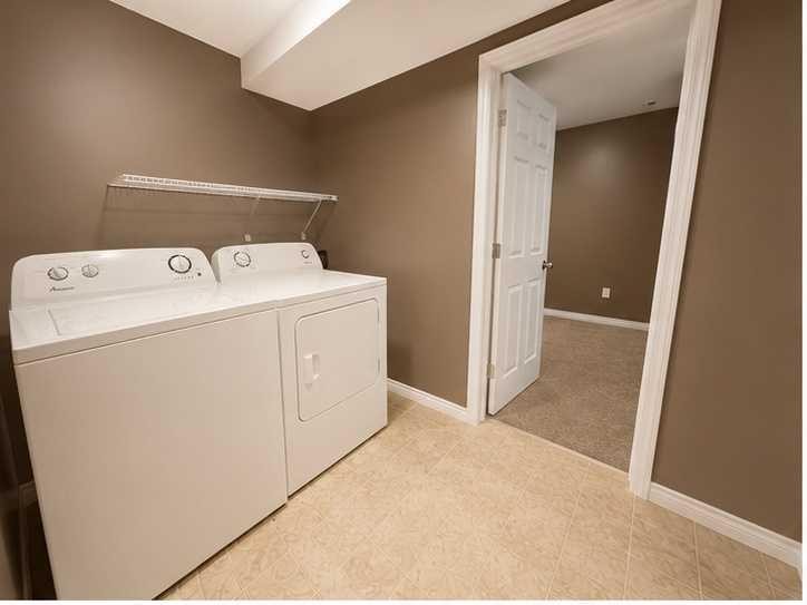 296 Cougar Way North, Lethbridge, AB - Indoor Photo Showing Laundry Room