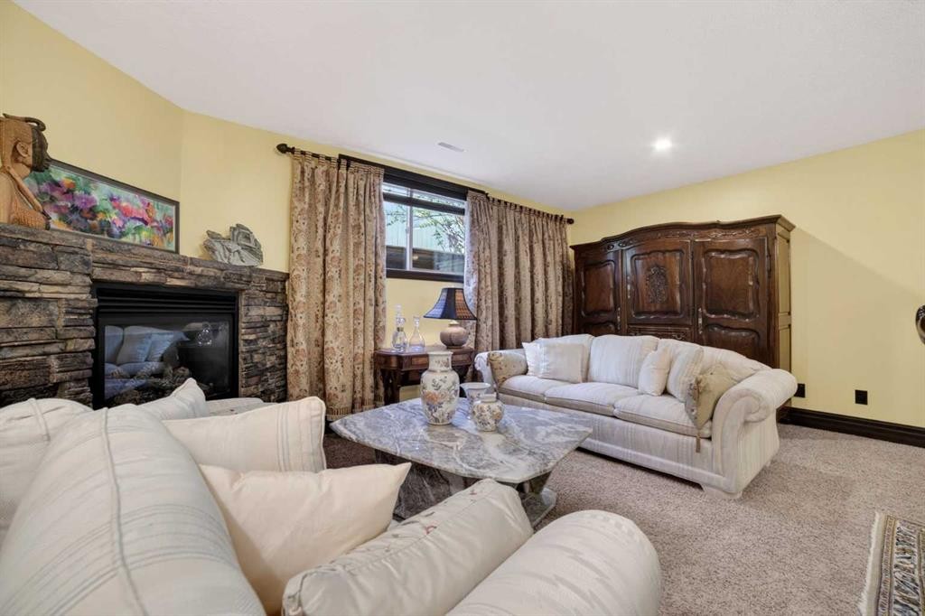 135 Garrison Drive, Fort Macleod, AB - Indoor Photo Showing Living Room With Fireplace