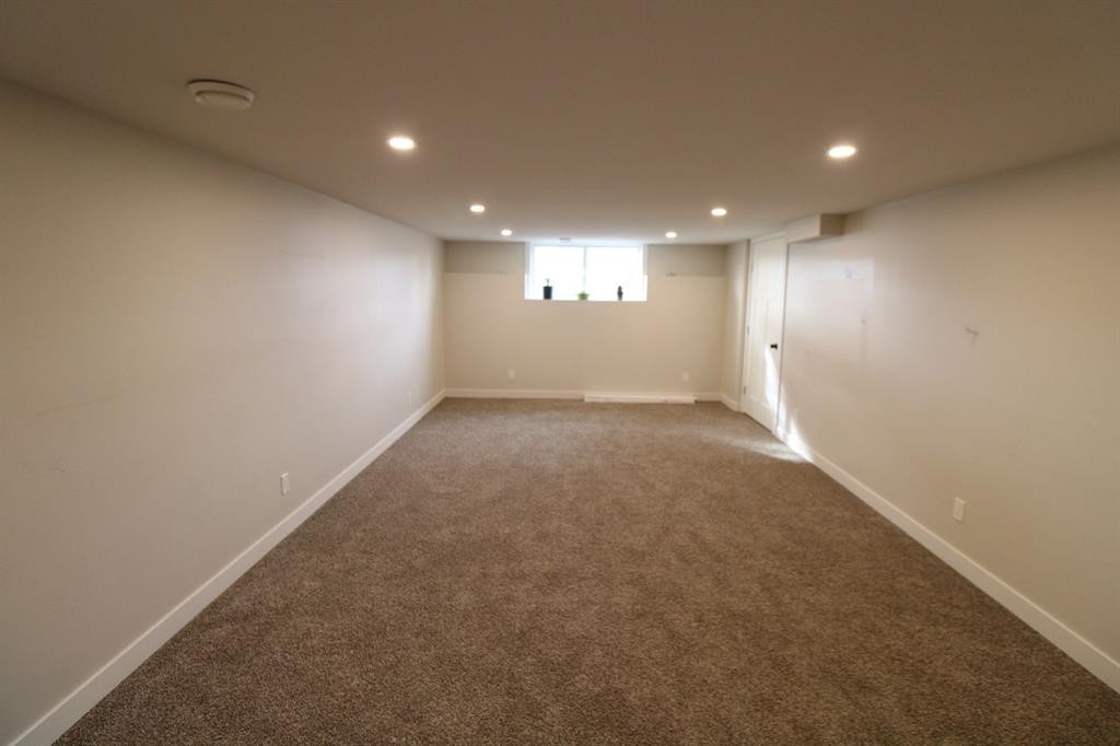 5715 56 St, Taber, AB - Indoor Photo Showing Basement