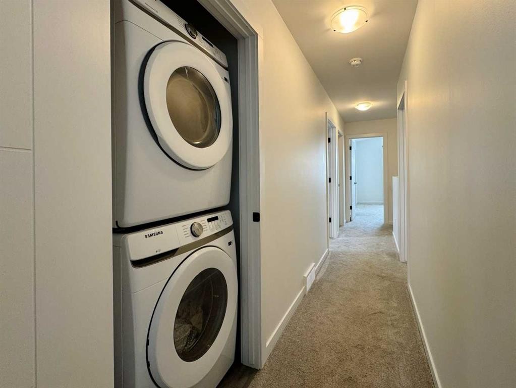 18 Blackwolf Pass North, Lethbridge, AB - Indoor Photo Showing Laundry Room