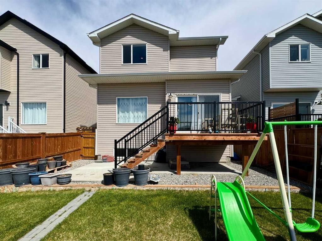 18 Blackwolf Pass North, Lethbridge, AB - Outdoor With Deck Patio Veranda With Exterior