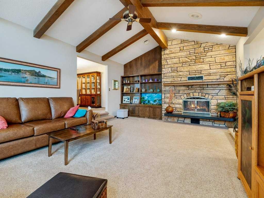 2201 21 Avenue, Coaldale, AB - Indoor Photo Showing Living Room With Fireplace