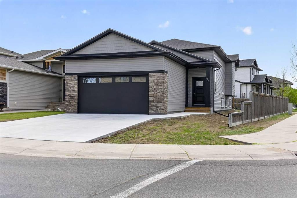 74 Riverpark Boulevard West, Lethbridge, AB - Outdoor With Facade