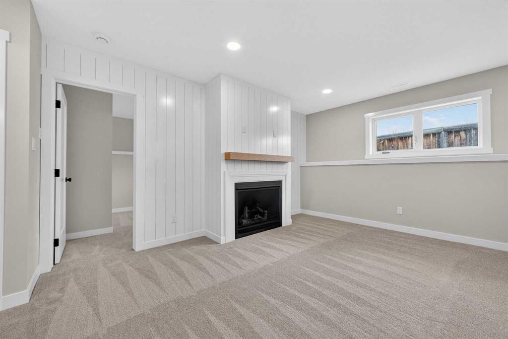 74 Riverpark Boulevard West, Lethbridge, AB - Indoor With Fireplace