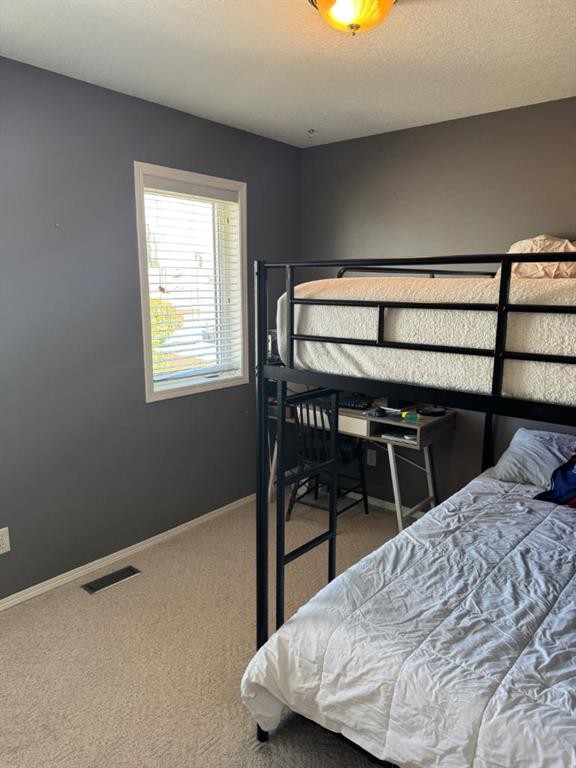 34 Riverbrook Close West, Lethbridge, AB - Indoor Photo Showing Bedroom