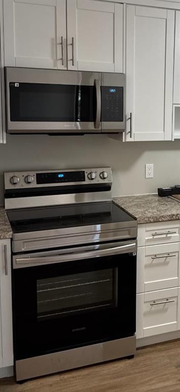 209-75 Temple Boulevard West, Lethbridge, AB - Indoor Photo Showing Kitchen With Upgraded Kitchen