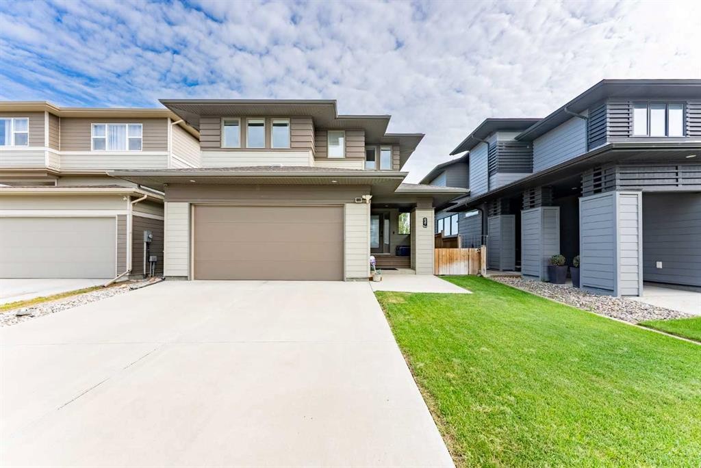437 Devonia Way West, Lethbridge, AB - Outdoor With Facade
