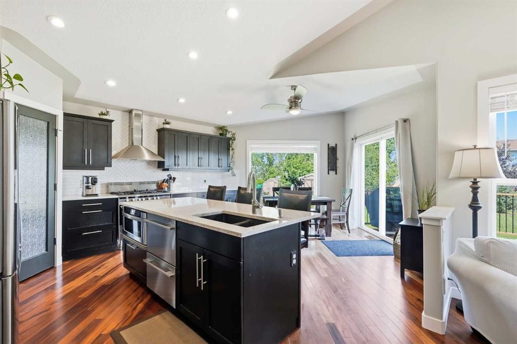 14 Lloyd Crescent Ne, Langdon, AB - Indoor Photo Showing Kitchen With Double Sink With Upgraded Kitchen
