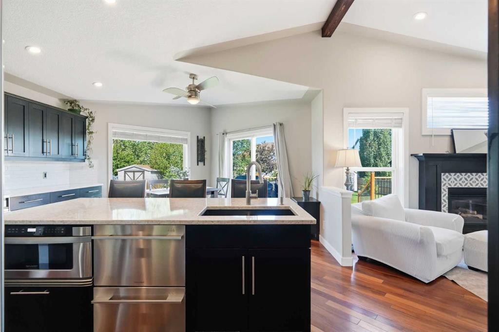 14 Lloyd Crescent Ne, Langdon, AB - Indoor With Fireplace