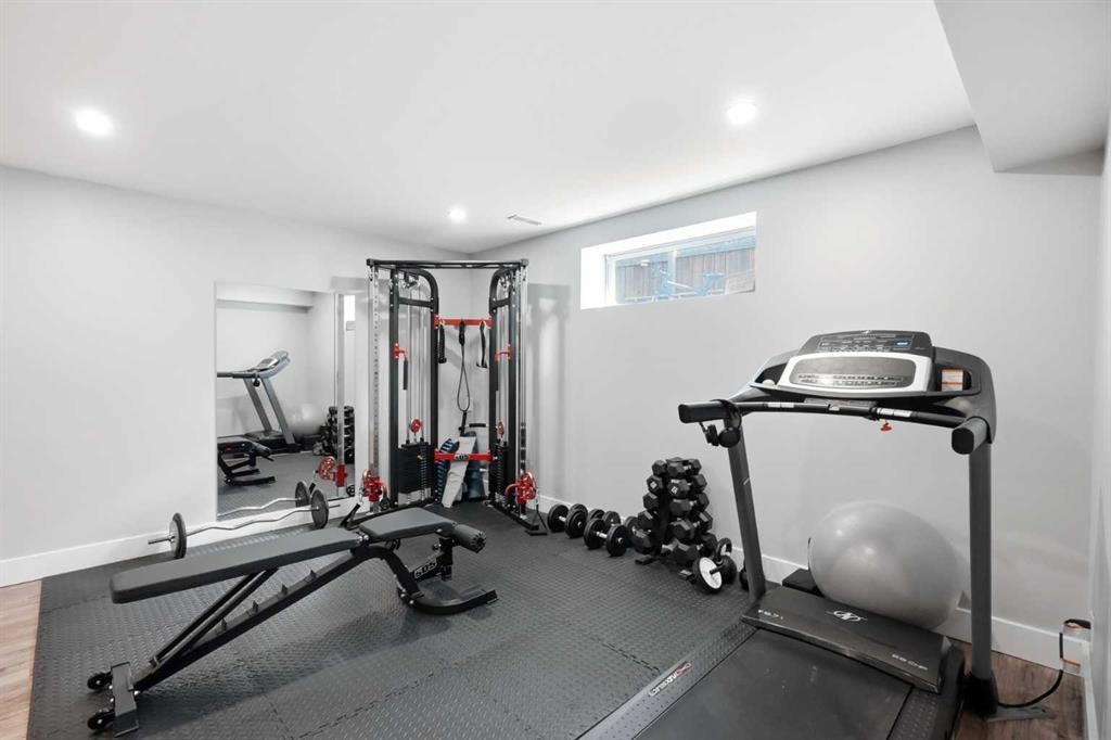 14 Lloyd Crescent Ne, Langdon, AB - Indoor Photo Showing Gym Room