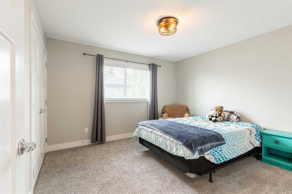 107 Westgate Drive, Coaldale, AB - Indoor Photo Showing Bedroom