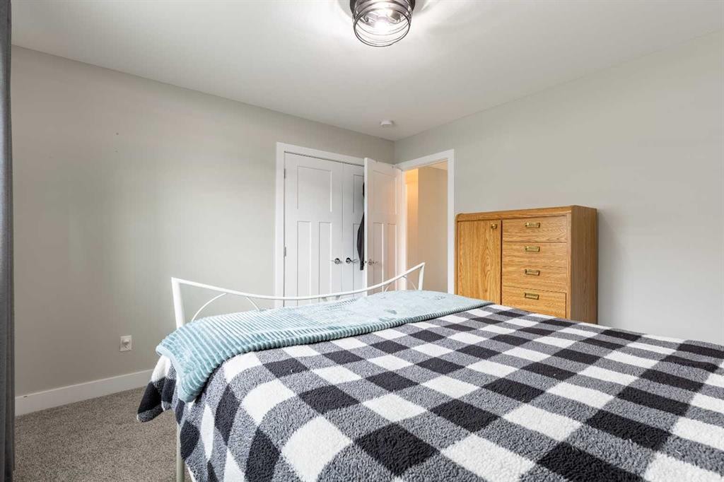 107 Westgate Drive, Coaldale, AB - Indoor Photo Showing Bedroom