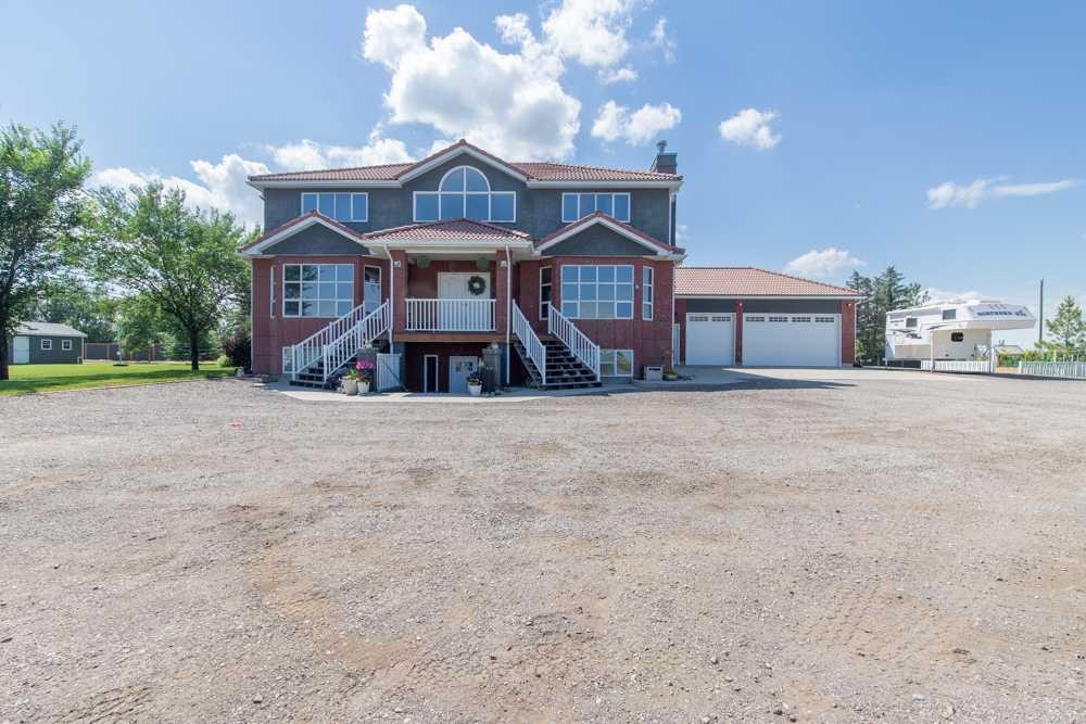 5-94046 Highway 843, Rural Lethbridge County, AB - Outdoor With Balcony With Facade