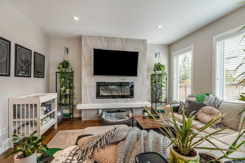 855 Miners Boulevard West, Lethbridge, AB - Indoor Photo Showing Living Room With Fireplace