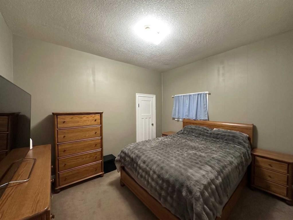 8017 22 Avenue, Coleman, AB - Indoor Photo Showing Bedroom