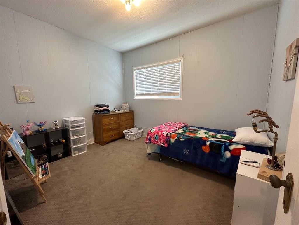 8017 22 Avenue, Coleman, AB - Indoor Photo Showing Bedroom