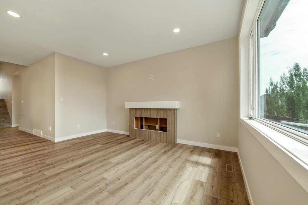 103 Riverford Close West, Lethbridge, AB - Indoor With Fireplace